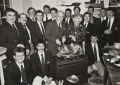 Picture:Brian Green - 1991 - RNLI Mrs Keene's Christmas Party - Jurat Guy Blampied carves the turkey with Mrs Georgina Keene
